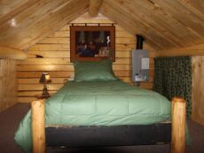 Bed in Eagle's Nest cabin
