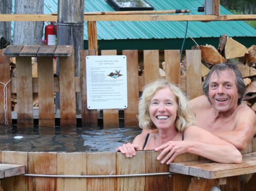 Man and lady enjoying hot tub